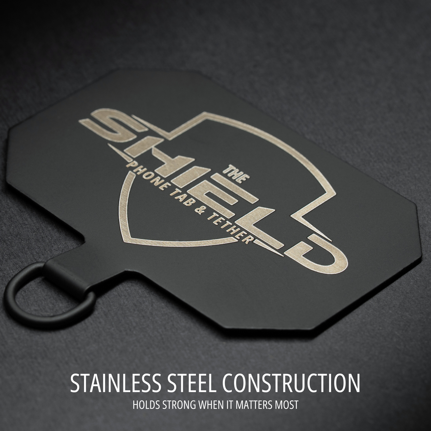 THE SHIELD™ Phone Tab & Tether